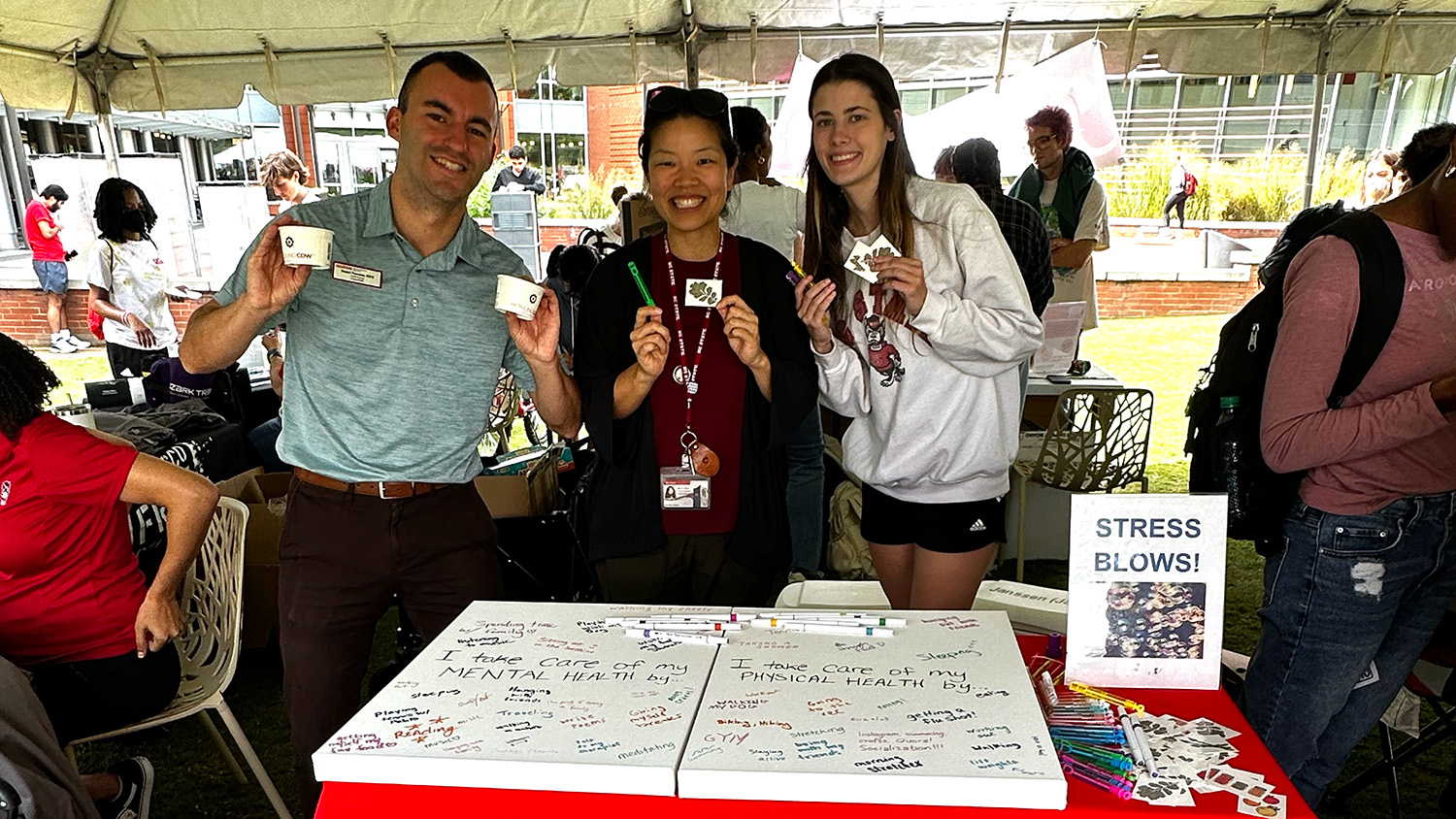 Campus health staff promote healthy campus week.