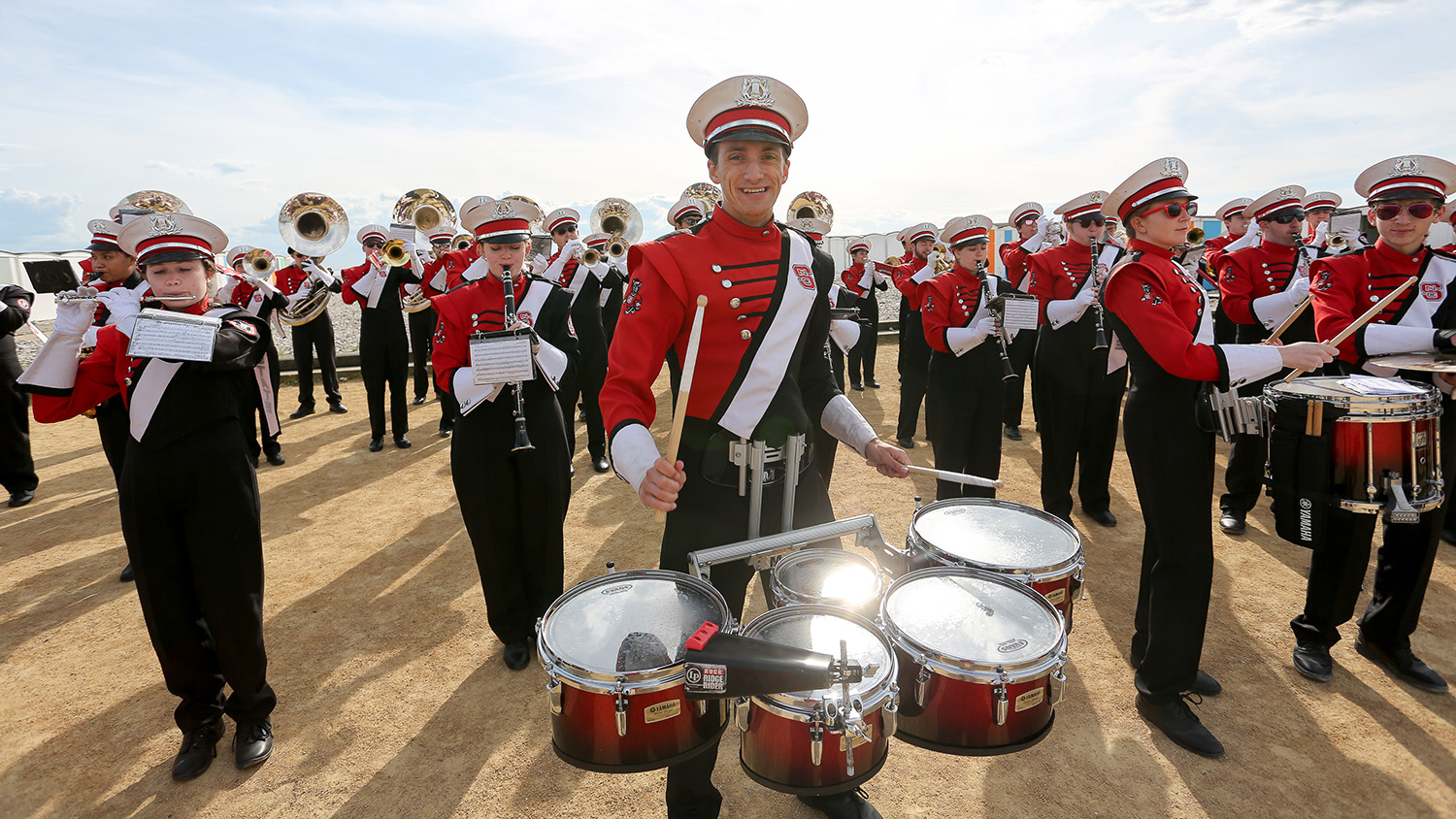 The NC State marching band gets ready to perform.