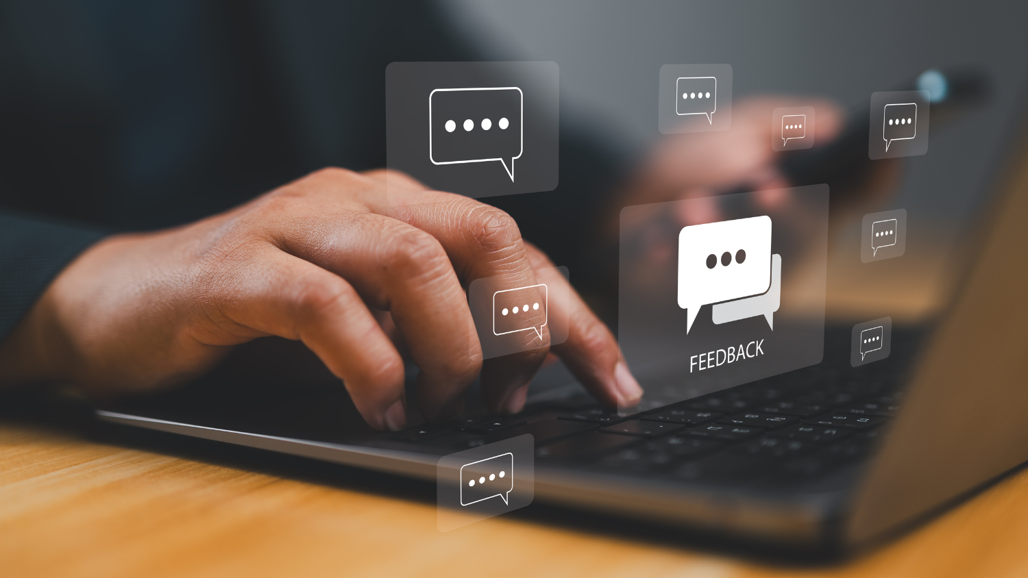 Closeup of hands typing on a computer keyboard