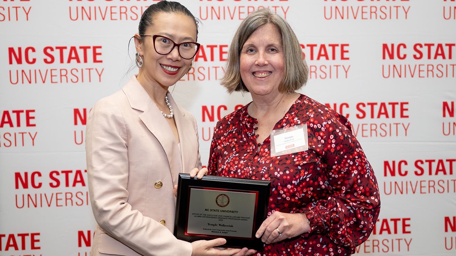 Professor Temple Walkowiak receives her Alumni Distinguished Graduate Professorship award.