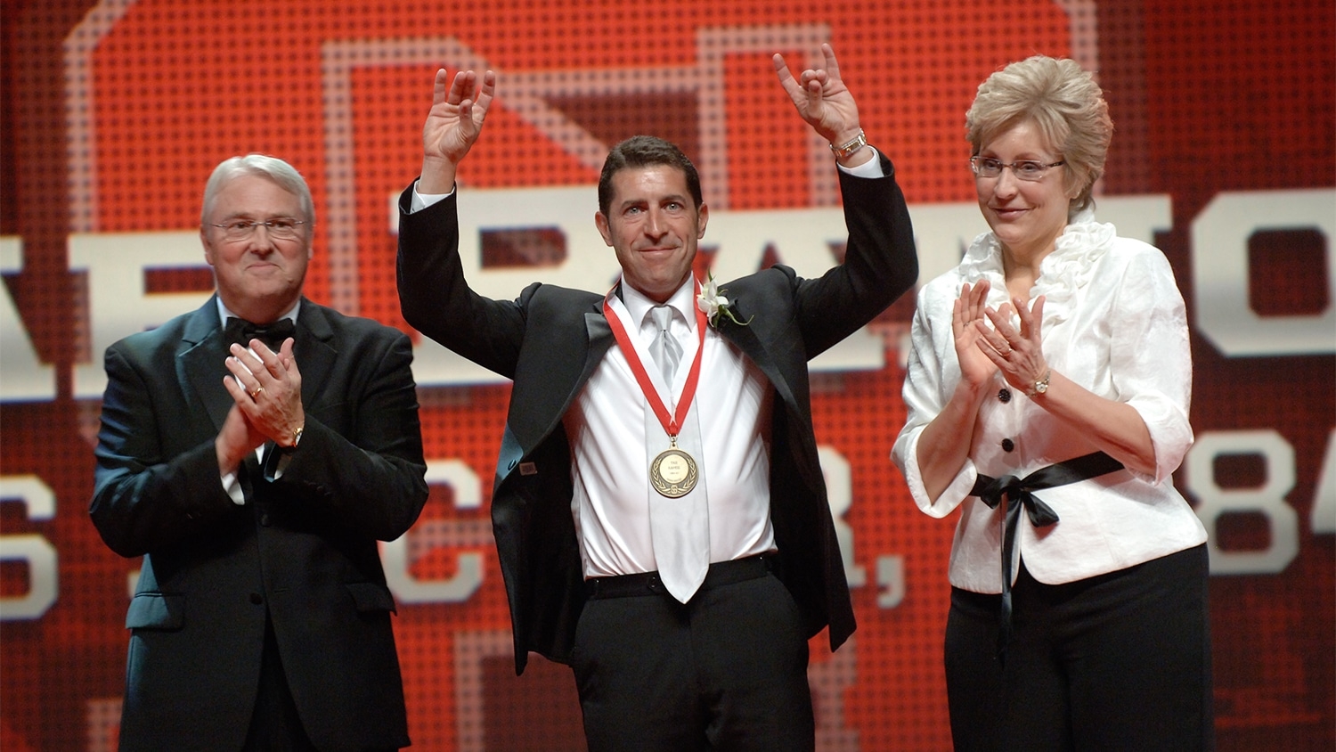 Tab Ramos celebrates at his induction to the NC State Athletics Hall of Fame.