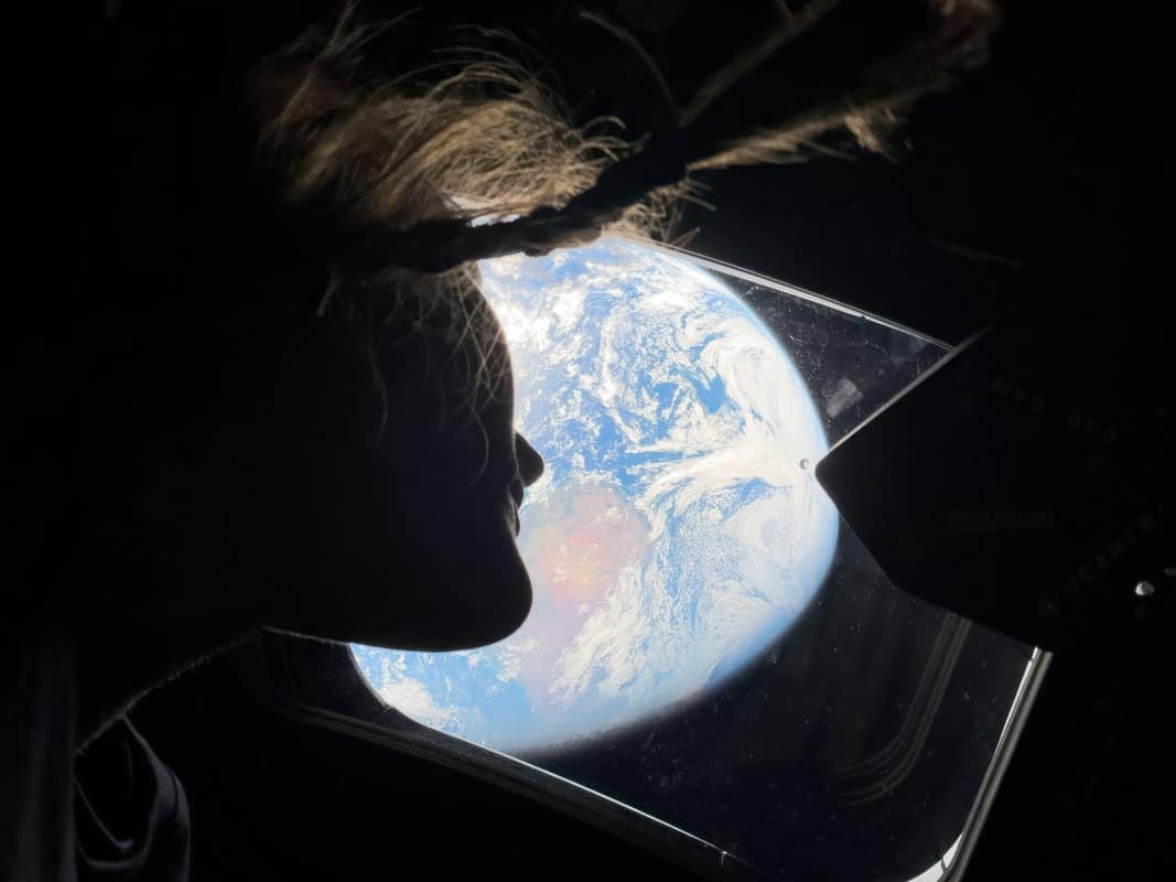 Christina Koch stares back at the earth from Space