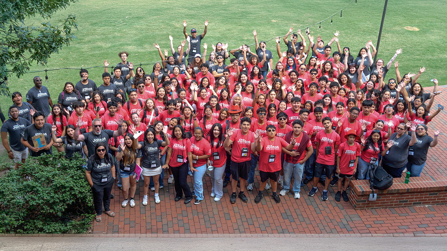 Juntos students and staff gather for a group picture outside Witherspoon Student Center.