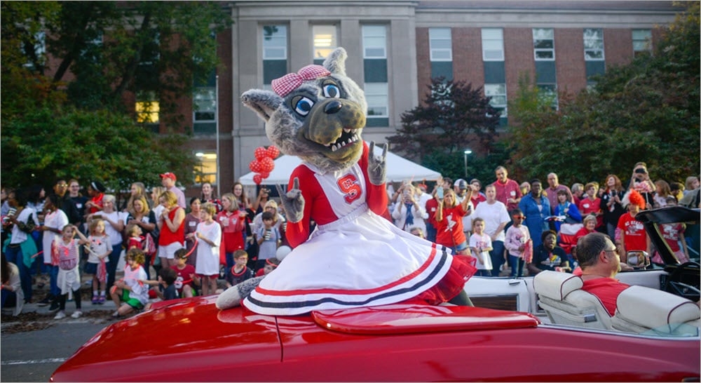 Homecoming parade 2017 on Hillsborough Street in front of Poole College of Management