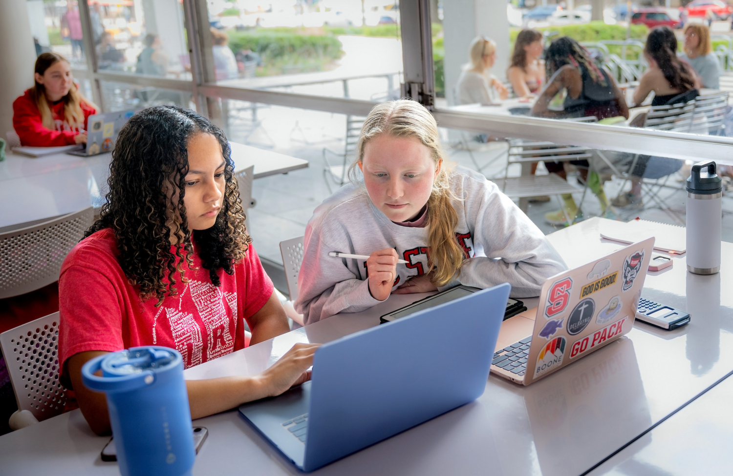 Makaylah Autry (left) and Gabrielle Dunlow work on physics homework at DH Hill, Jr. Library during the fall 2025 semester. Photo by Becky Kirkland.