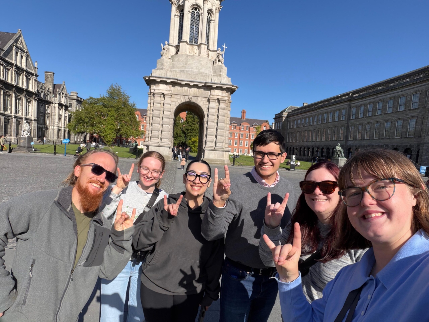A group of students stand by a monument in Ireland.
