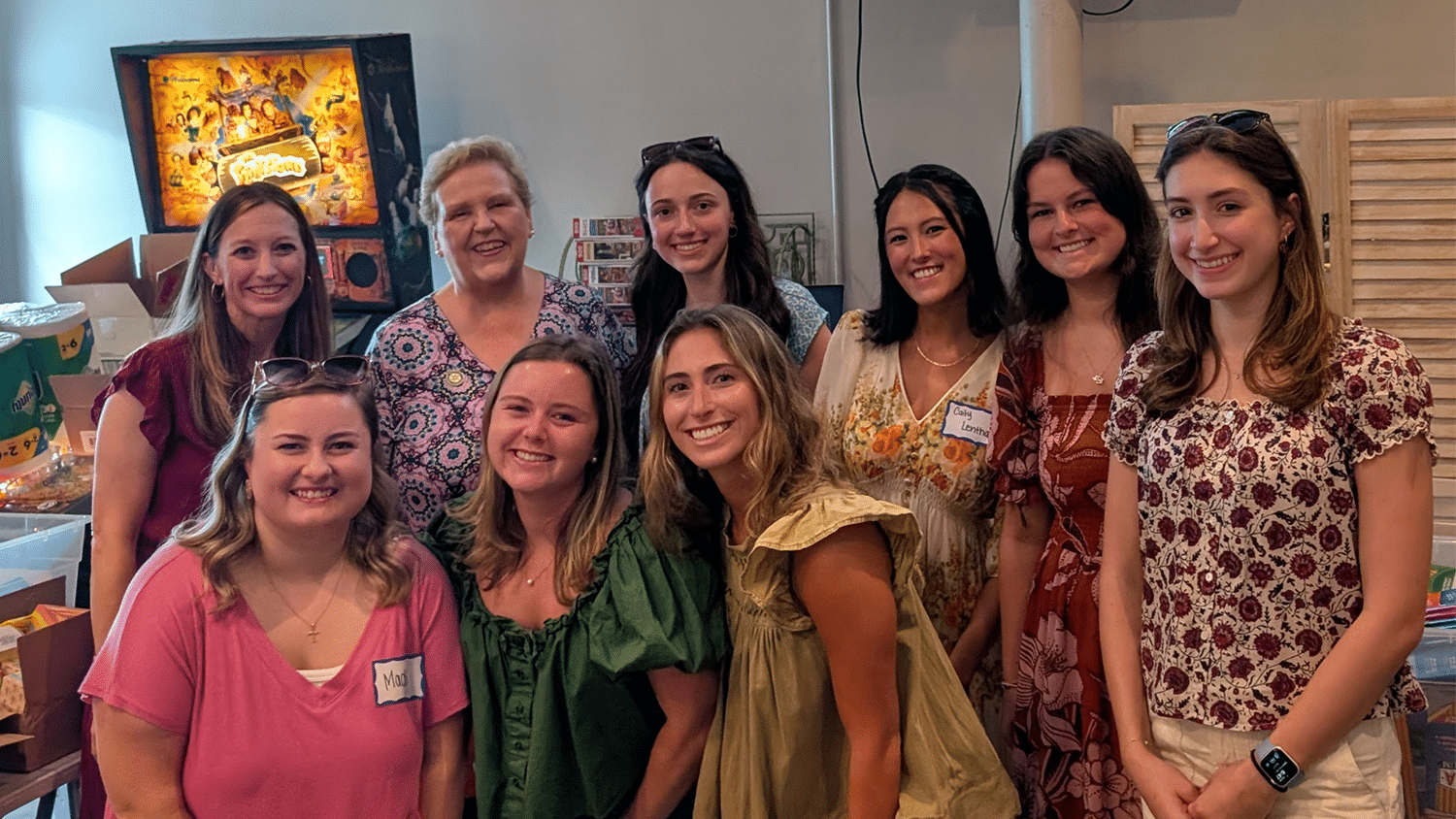 Associate Teaching Professor Jill Jones stands with College of Education elementary education alumni.