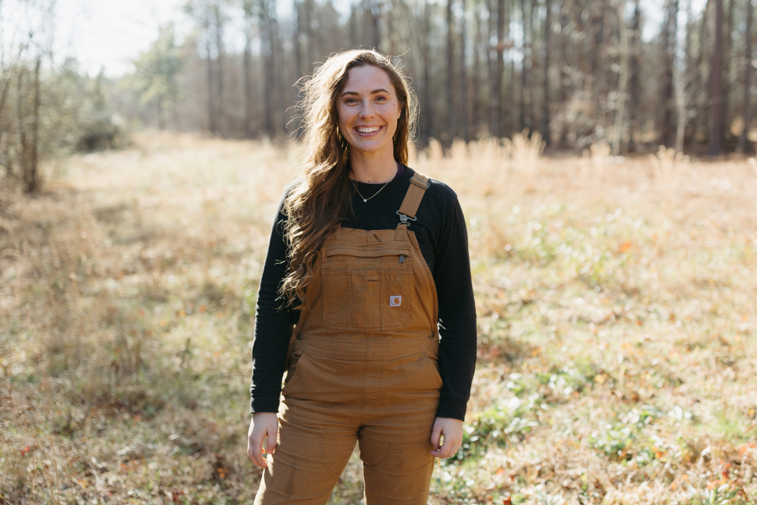 woman standing in a field