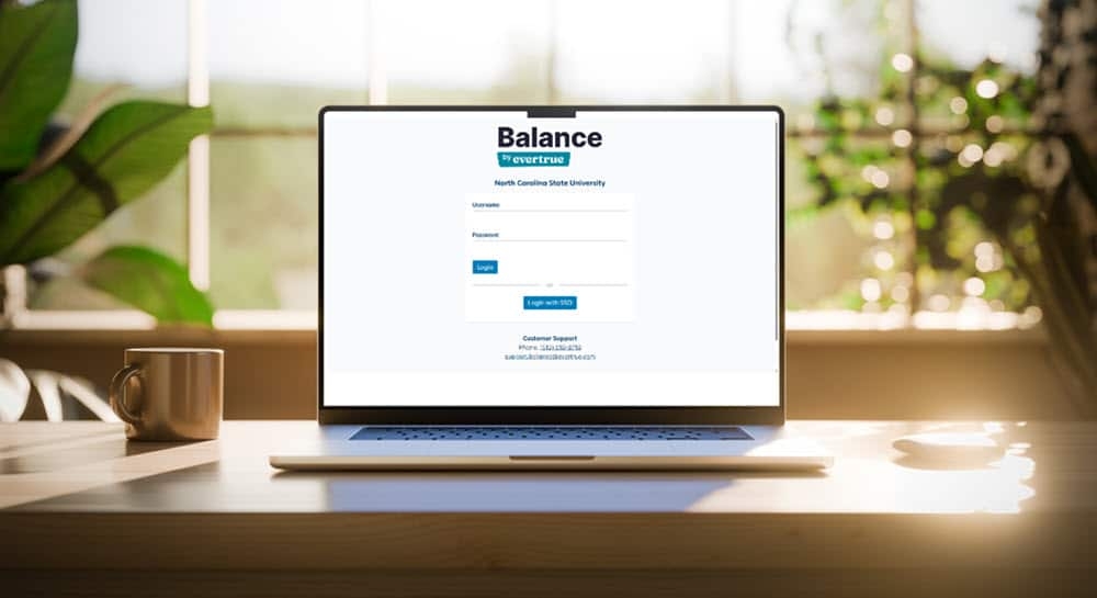Laptop with Balance by EverTrue login on the screen