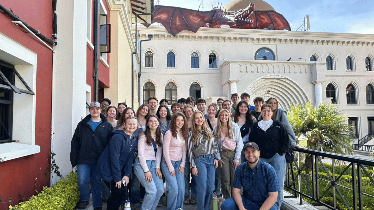 Image of students studying abroad standing in a group and smiling